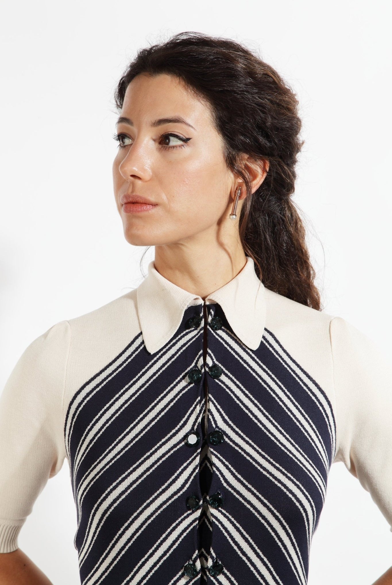 Combelle Colbert Dress front view with model in side profile, showing diagonal stripe pattern across the bodice