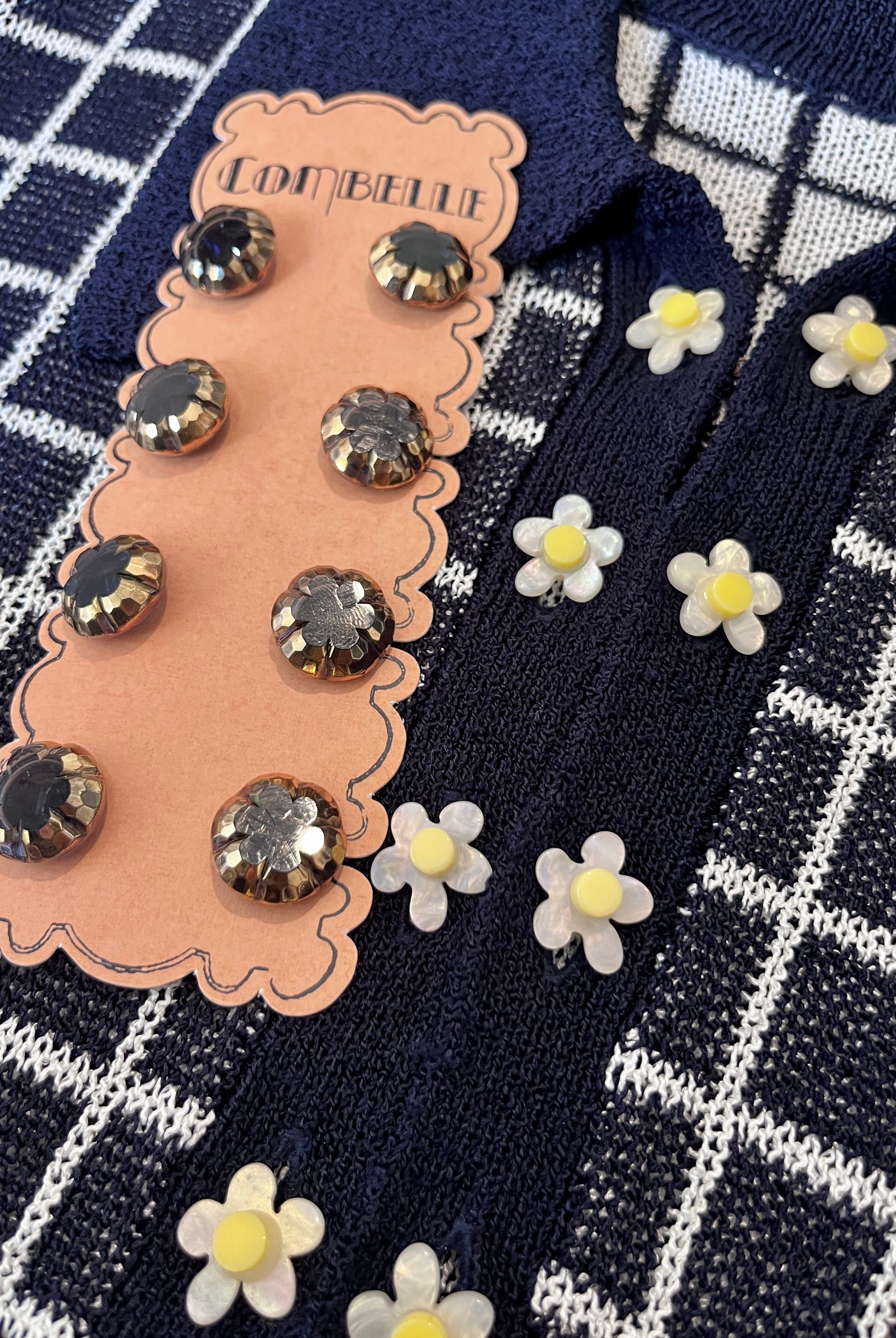 Combelle Madison Top navy colourway with both interchangeable button sets — daisy chain cufflink buttons for day and hand-painted artisan glass buttons for evening