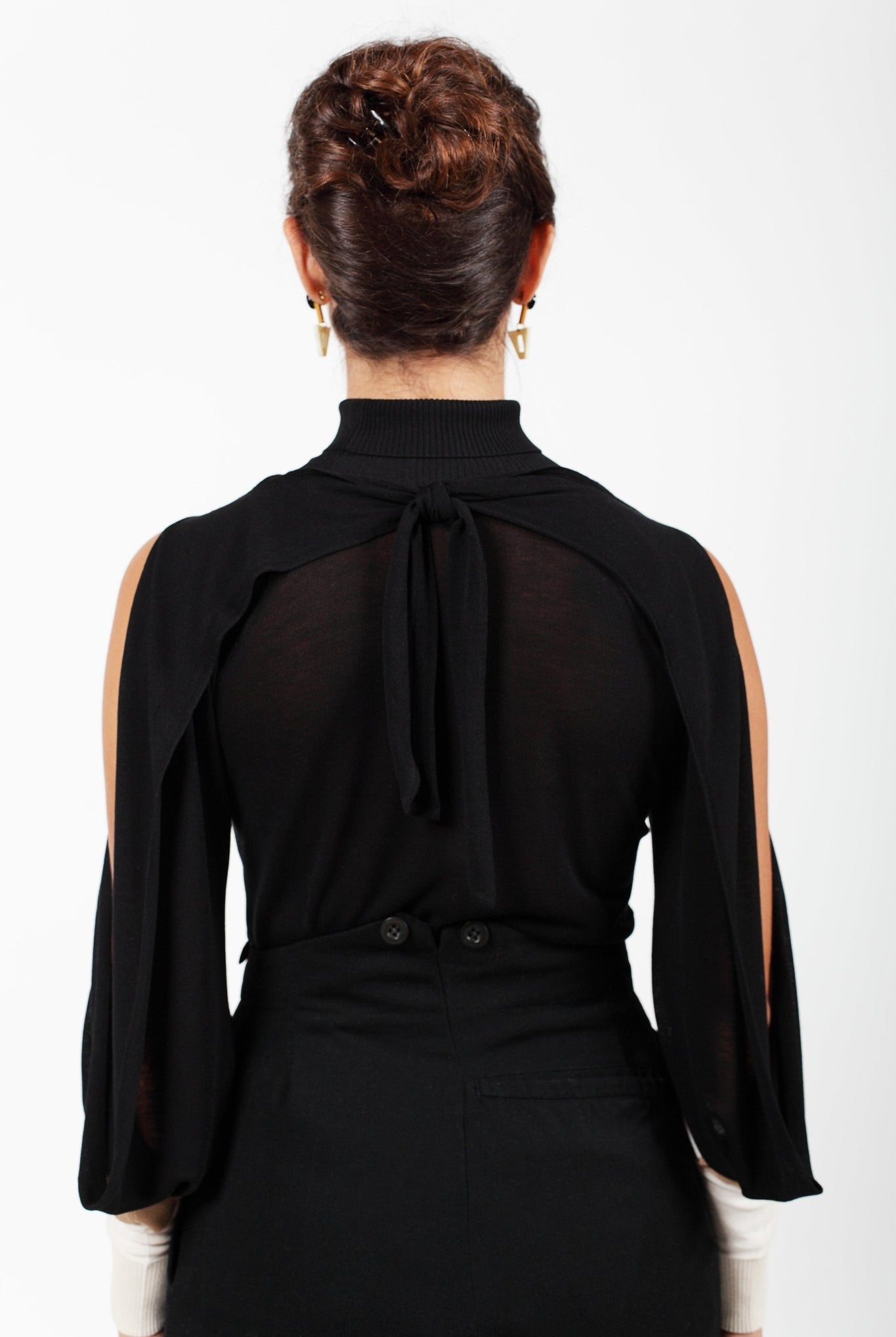 Combelle Elsa Top in black, back view close crop showing the open shoulder construction and back neckline detail