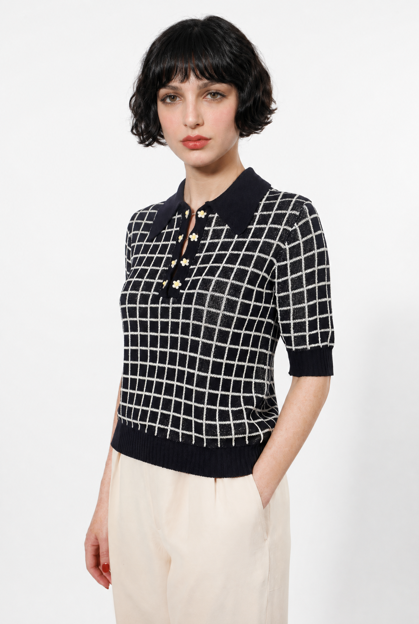 Combelle Madison Top in navy, front upper body view showing the boxy fit untucked, check pattern and daisy chain button placket