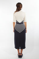 Combelle Colbert Dress full-length back view showing continuous diagonal stripe pattern