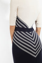 Combelle Colbert Dress side rear view showing fitted pencil skirt and diagonal stripe bodice