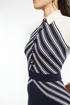 Combelle Colbert Dress three-quarter front view showing diagonal stripes accentuating the silhouette
