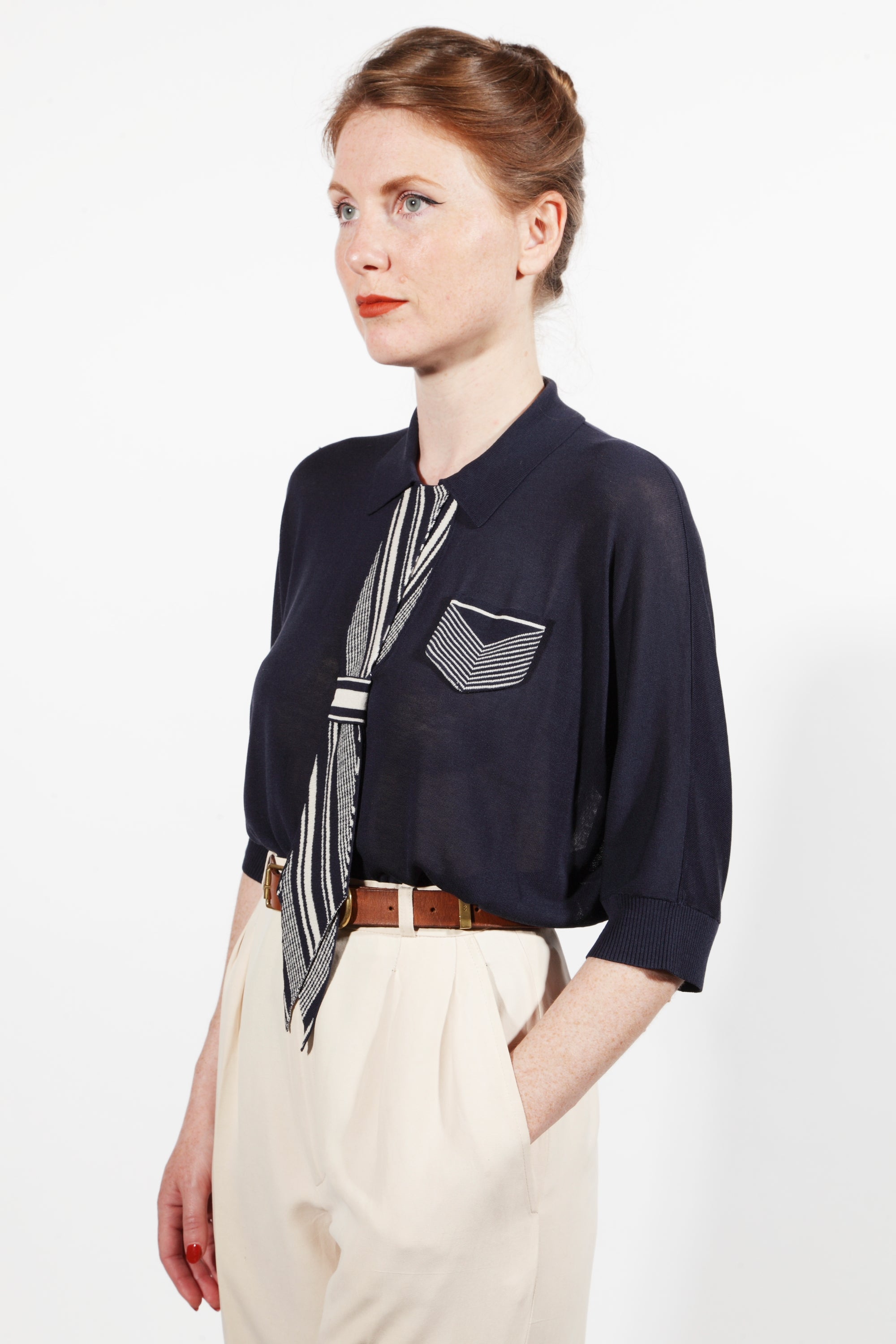Combelle Eton Blouse navy front three-quarter view showing knit blouse with tie detail