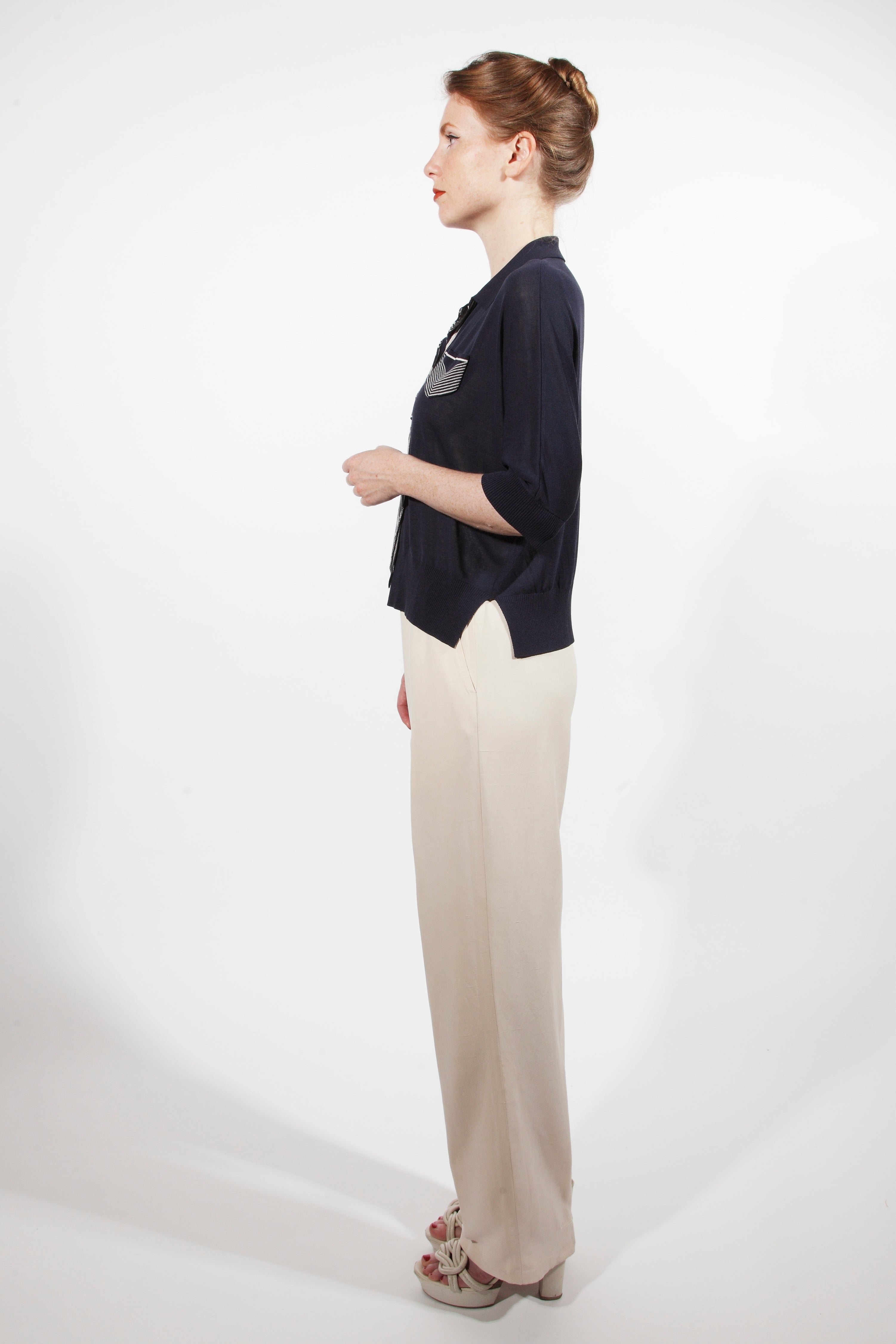 Combelle Eton Blouse navy full-length side view showing relaxed silhouette with cream trousers