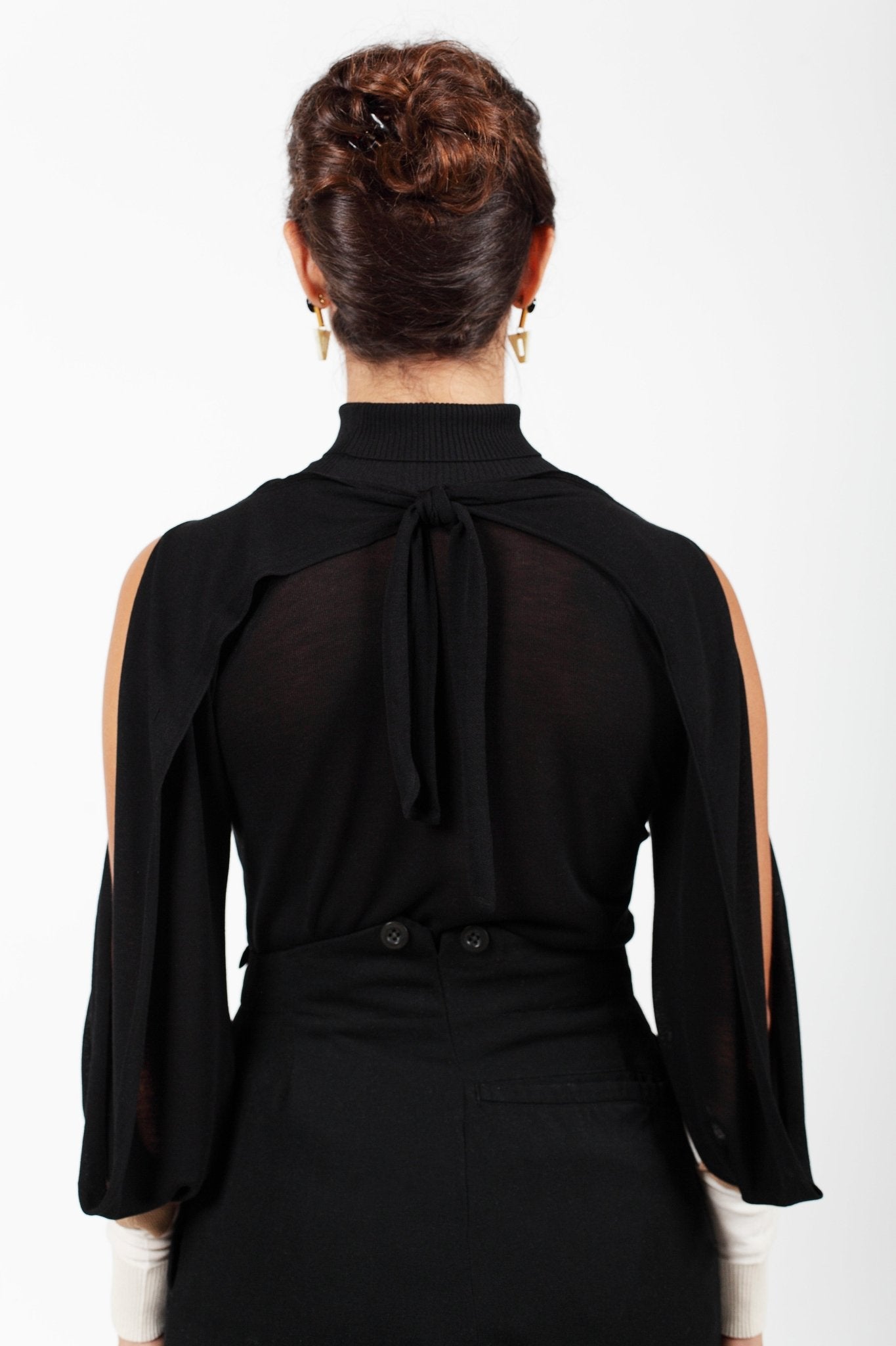 Combelle Elsa Top in black, back view close crop showing the open shoulder construction and back neckline detail