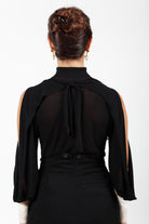 Combelle Elsa Top in black, back view close crop showing the open shoulder construction and back neckline detail