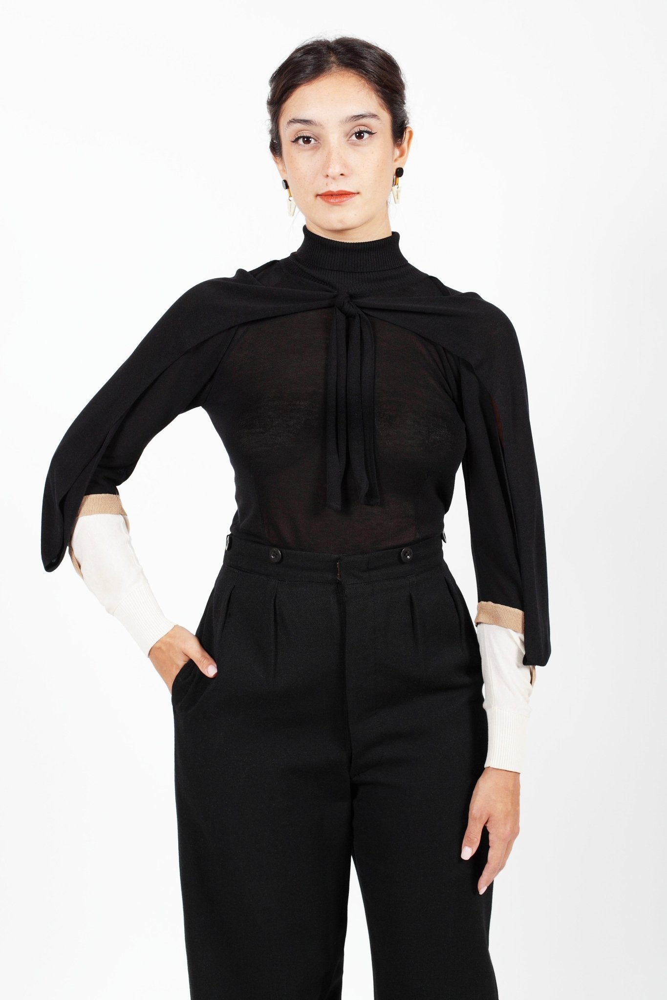 Combelle Elsa Top in black, front view showing the rabbit ear ties threaded through the collar for a minimal daytime look
