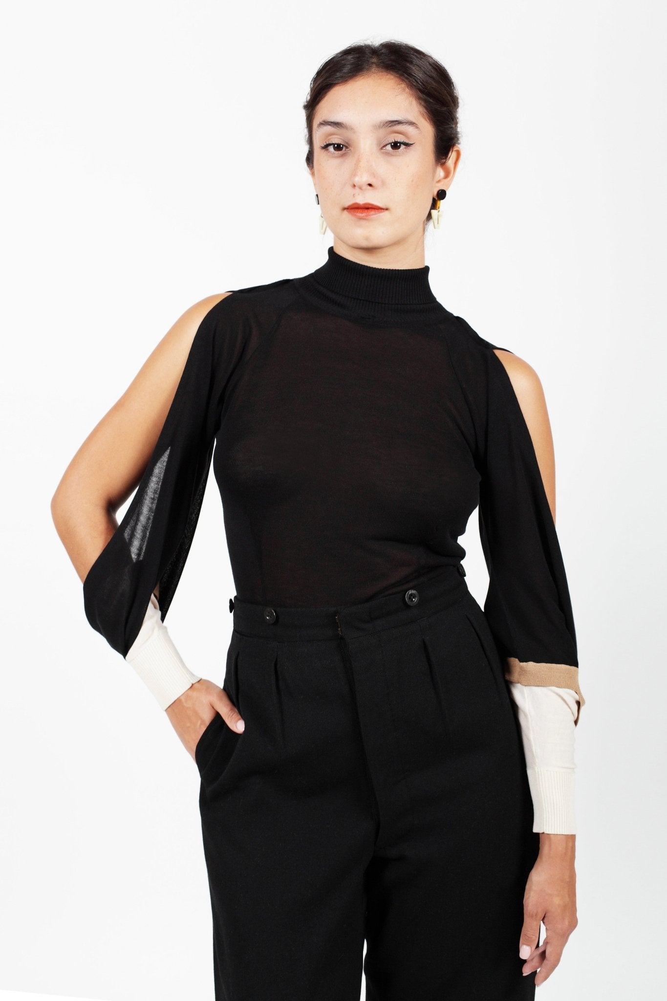 Combelle Elsa Top in black, full length front view showing the open sleeve construction and high neck against a white background