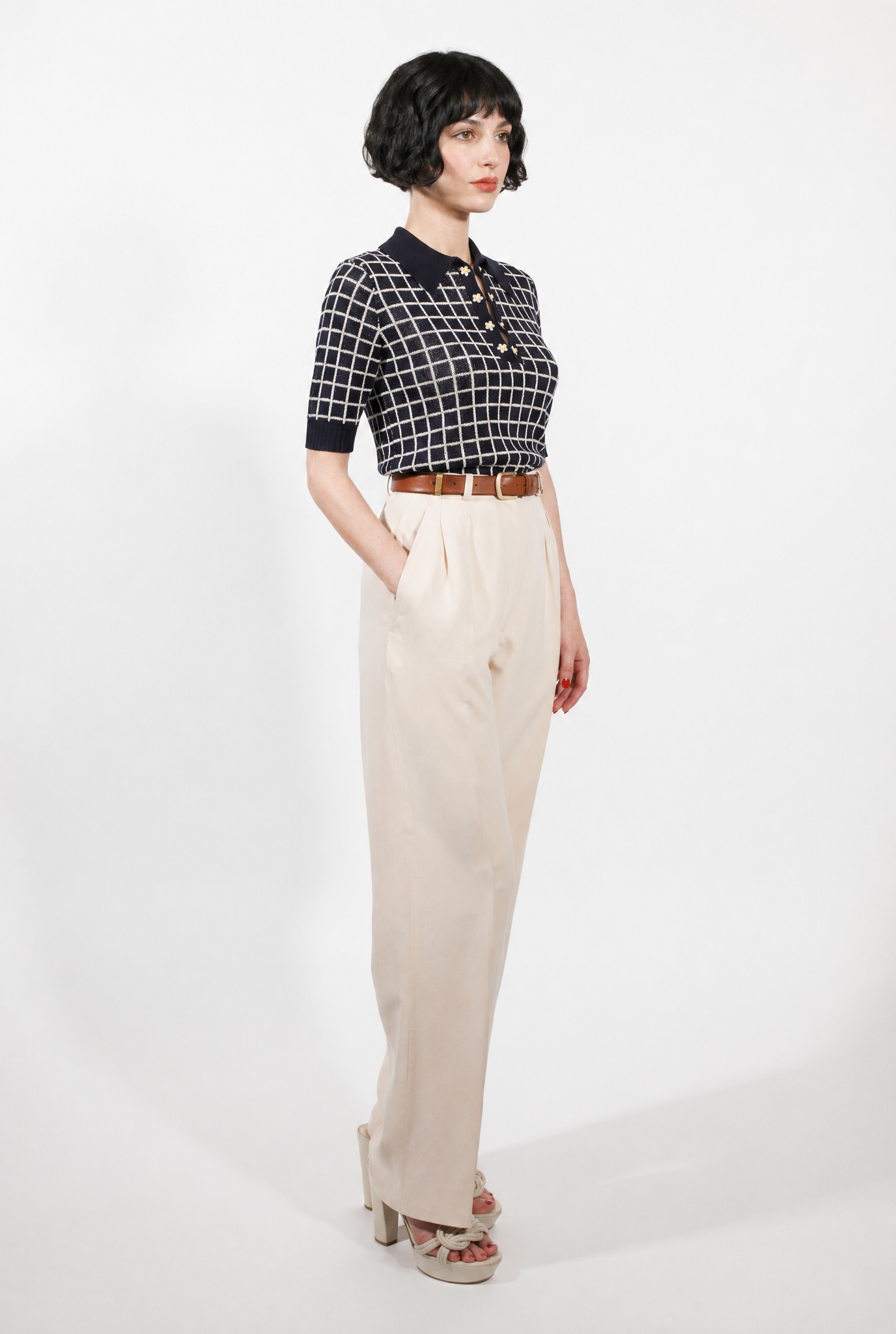 Combelle Madison Top in navy, full length three-quarter view showing the complete silhouette and two-tone check against cream wide-leg trousers