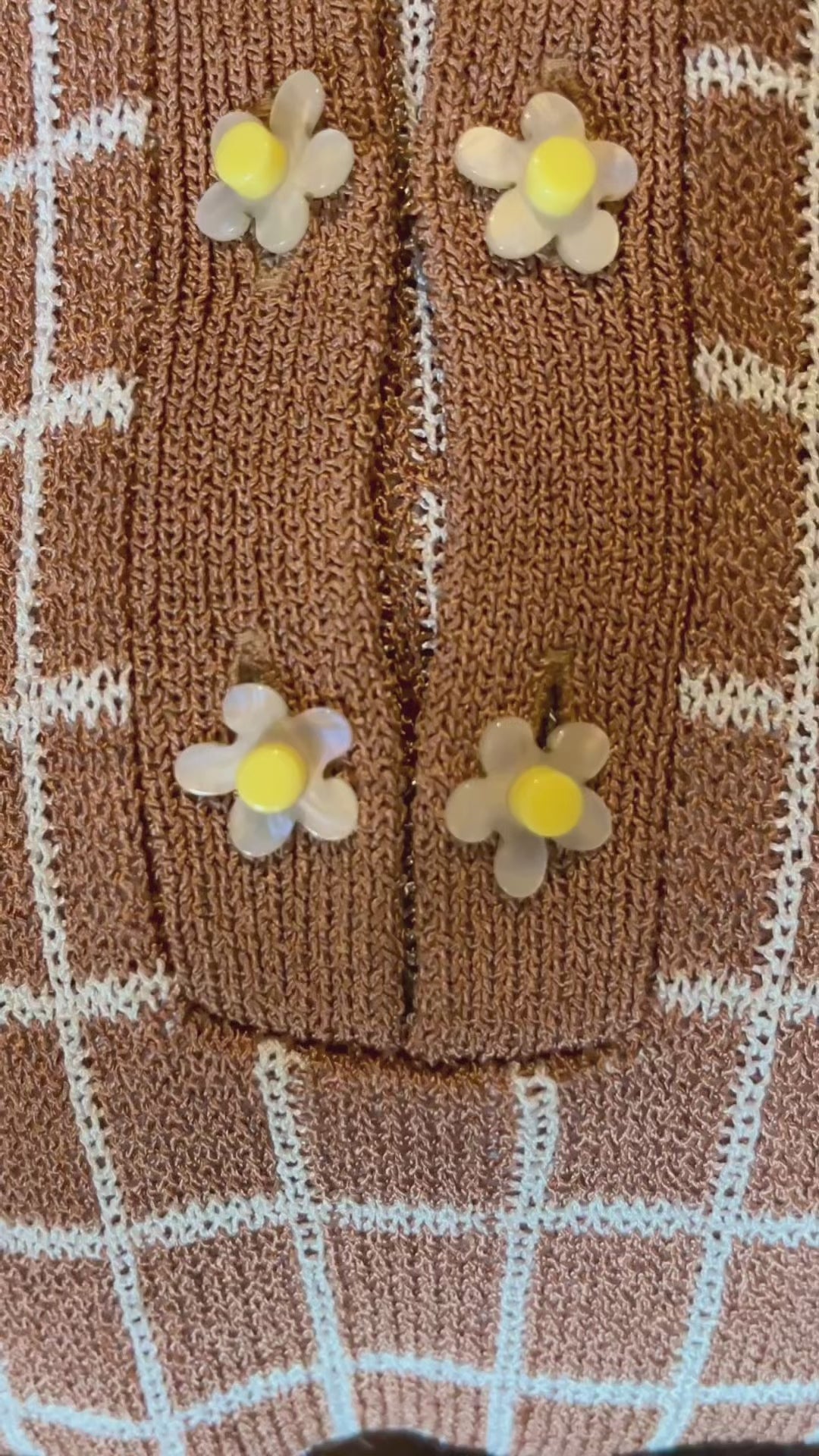 Combelle Madison Top tobacco close-up video with hand-painted glass evening buttons, showing the fabric drape, surface texture and artisan button quality
