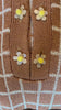 Combelle Madison Top tobacco close-up video with hand-painted glass evening buttons, showing the fabric drape, surface texture and artisan button quality
