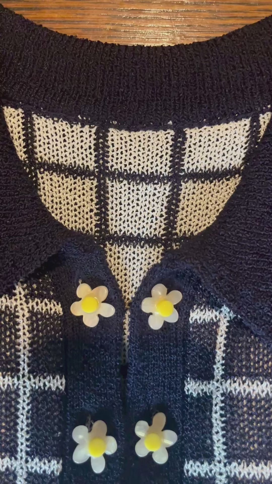Combelle Madison Top daisy chain cufflink button detail video — close-up pan showing the removable daywear buttons across both navy and tobacco colourways
