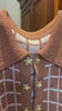 Combelle Madison Top daisy chain cufflink button detail video — close-up pan showing the removable daywear buttons across both tobacco and navy colourways